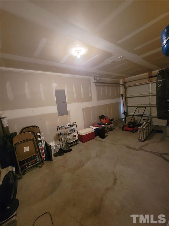 6343 Slopeside Court Raleigh, NC 27610 - Photo 14 of 14 a view of a room with gym equipment