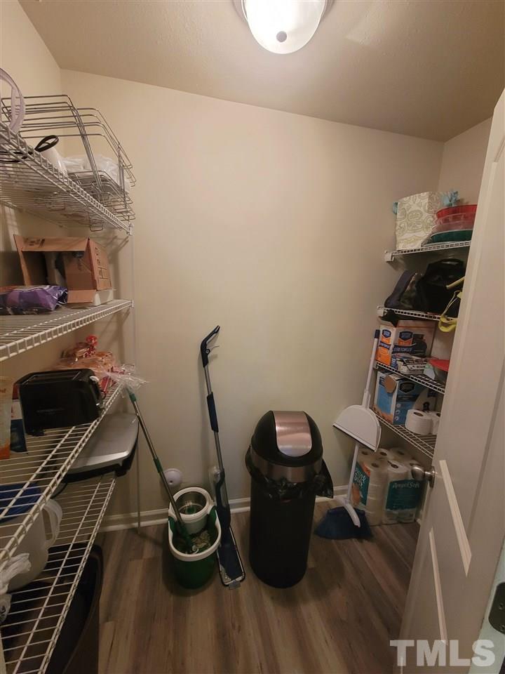 6343 Slopeside Court Raleigh, NC 27610 - Photo 10 of 14 a room with storage and utility