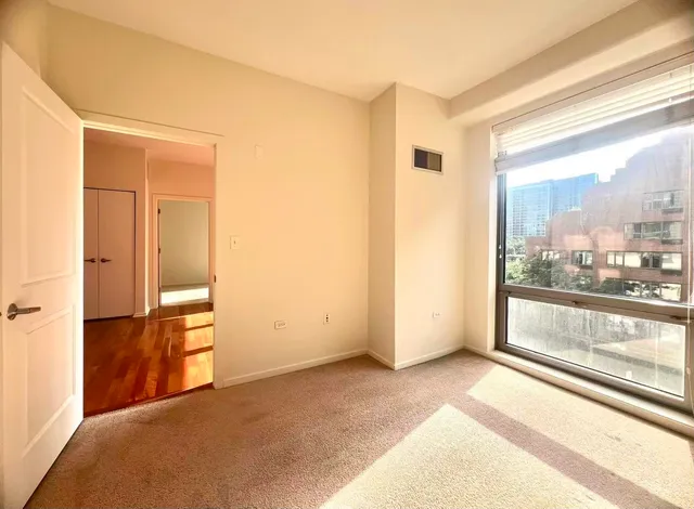 a view of a room with large windows