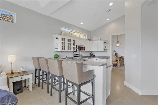 $590,000 | 15464 Cortona Way, Naples, FL 34120