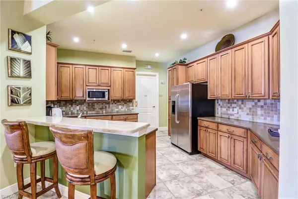 $590,000 | 15464 Cortona Way, Naples, FL 34120