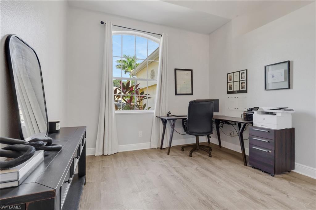 15464 Cortona Way Naples, FL 34120 - Photo 7 of 47 Office space with light wood-type flooring and baseboards