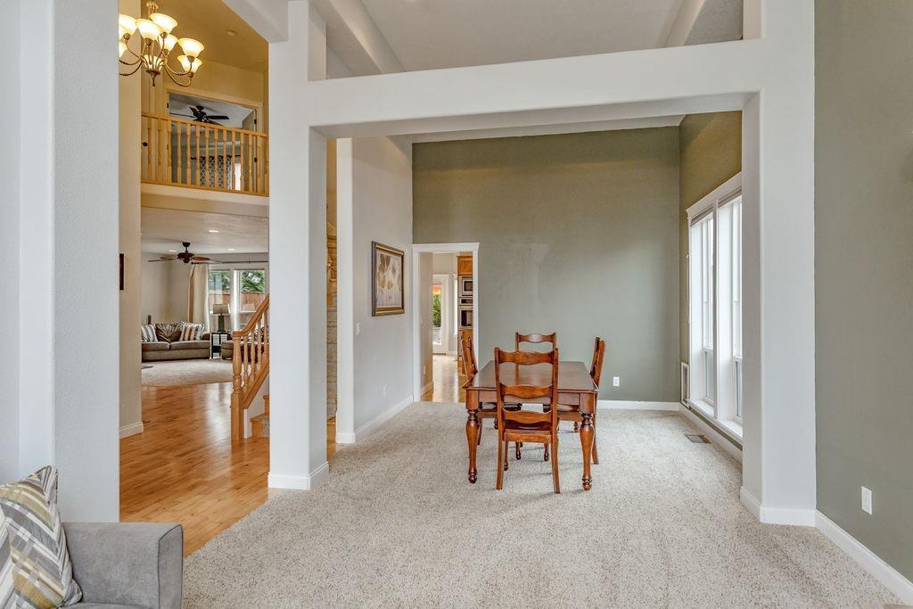 1042 Pumpkin Ridge Eagle Point, OR 97524 - Photo 17 of 34 a dining room with furniture and a livingroom view