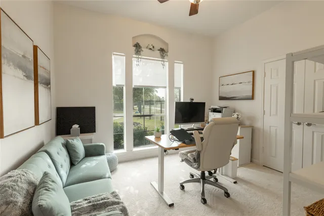 a bathroom with a double vanity sink mirror and bathtub