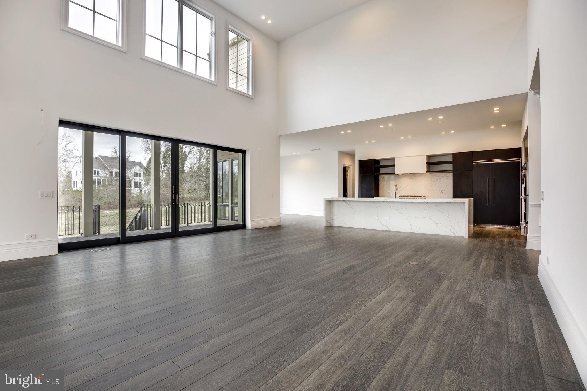 23075 Red Sunset Place Aldie, VA 20105 - Photo 17 of 89 Great Room with sliding pocket doors to rear porch