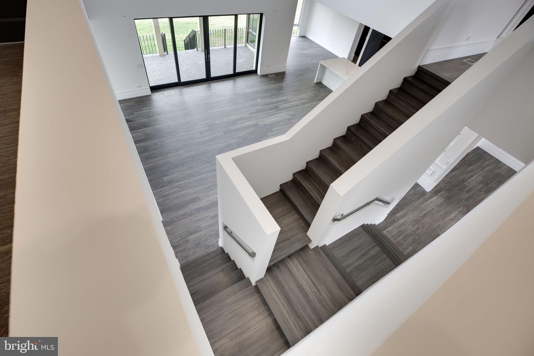 23075 Red Sunset Place Aldie, VA 20105 - Photo 37 of 89 Staircase to upper level