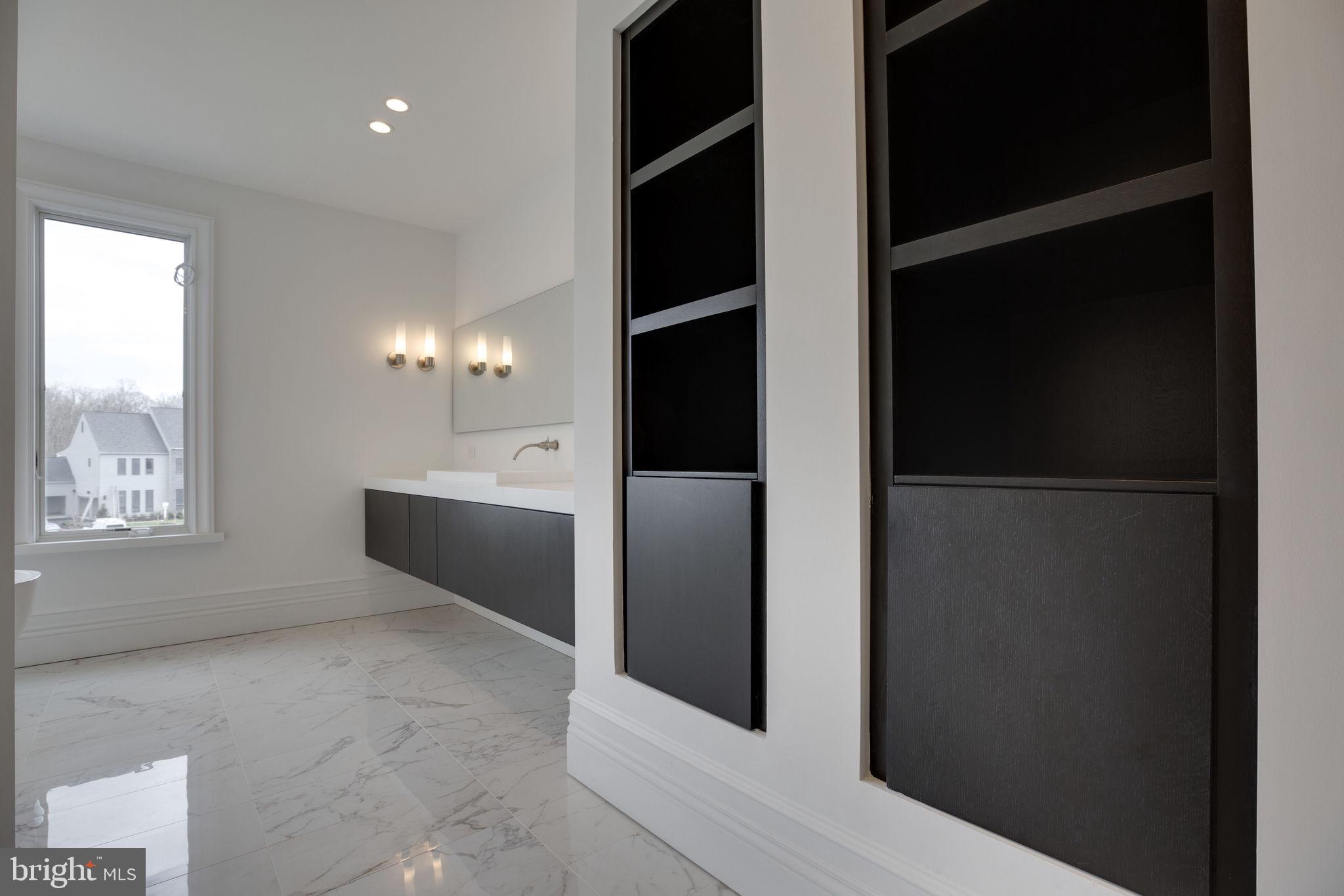 23075 Red Sunset Place Aldie, VA 20105 - Photo 57 of 89 Owner's Bath w/ built-in cabinetry for linens