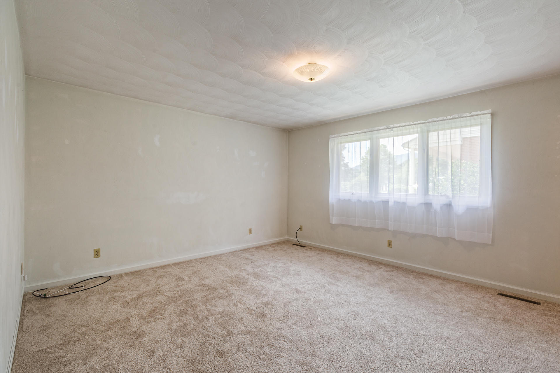 4925 Grape Tree Lane Roanoke, VA 24018 - Photo 19 of 27 an empty room with a empty space and windows