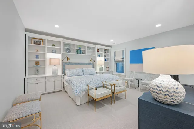 a view of a small garden with wooden fence