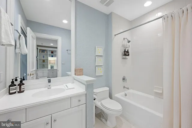 a view of a lobby with furniture and floor to ceiling window