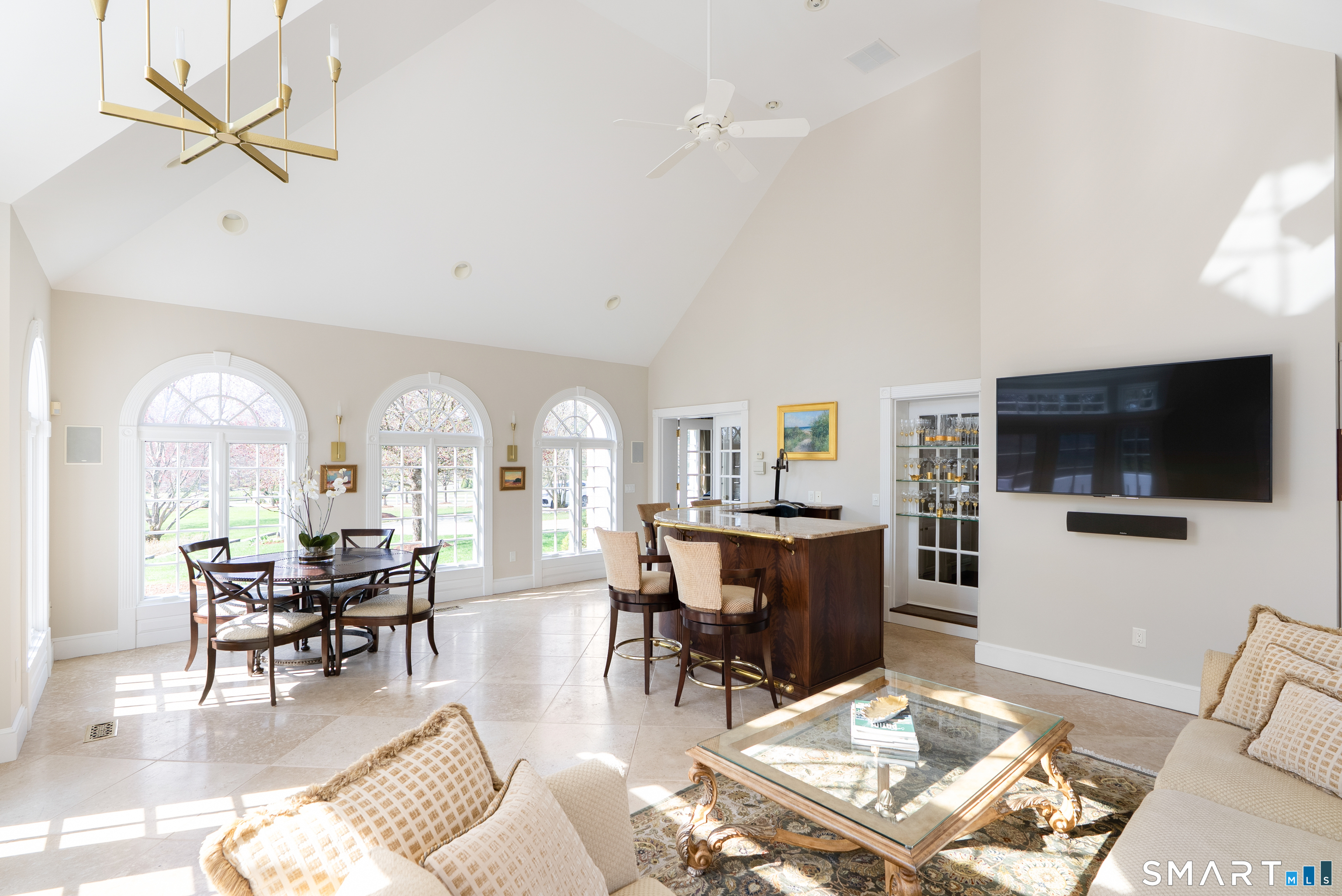 57 Thistledown Suffield, CT 06078 - Photo 8 of 39 a view of a livingroom with furniture and a flat screen tv