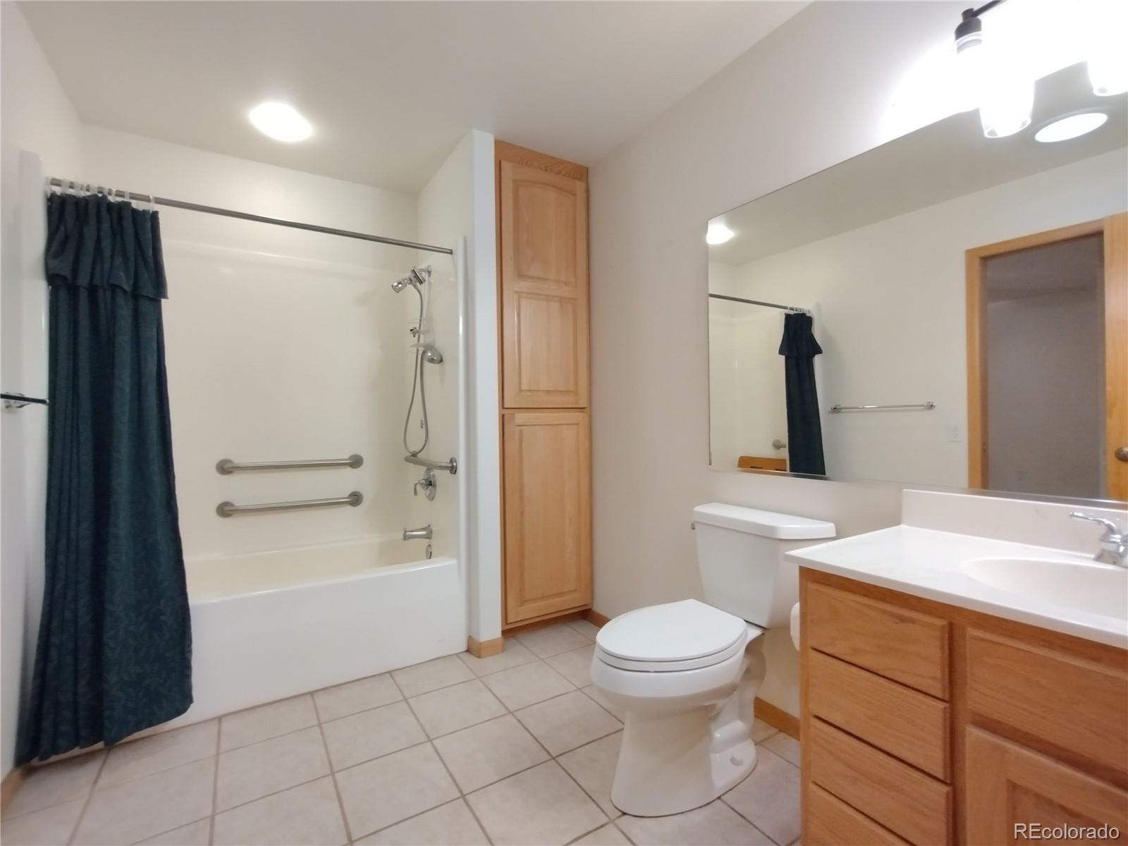 8120 Table Mountain Road Rye, CO 81069 - Photo 23 of 50 a bathroom with a toilet a sink and shower