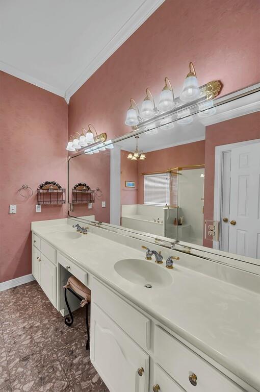 3111 Rockbridge Road Waco, TX 76657 - Photo 17 of 40 a bathroom with a sink a vanity and a mirror