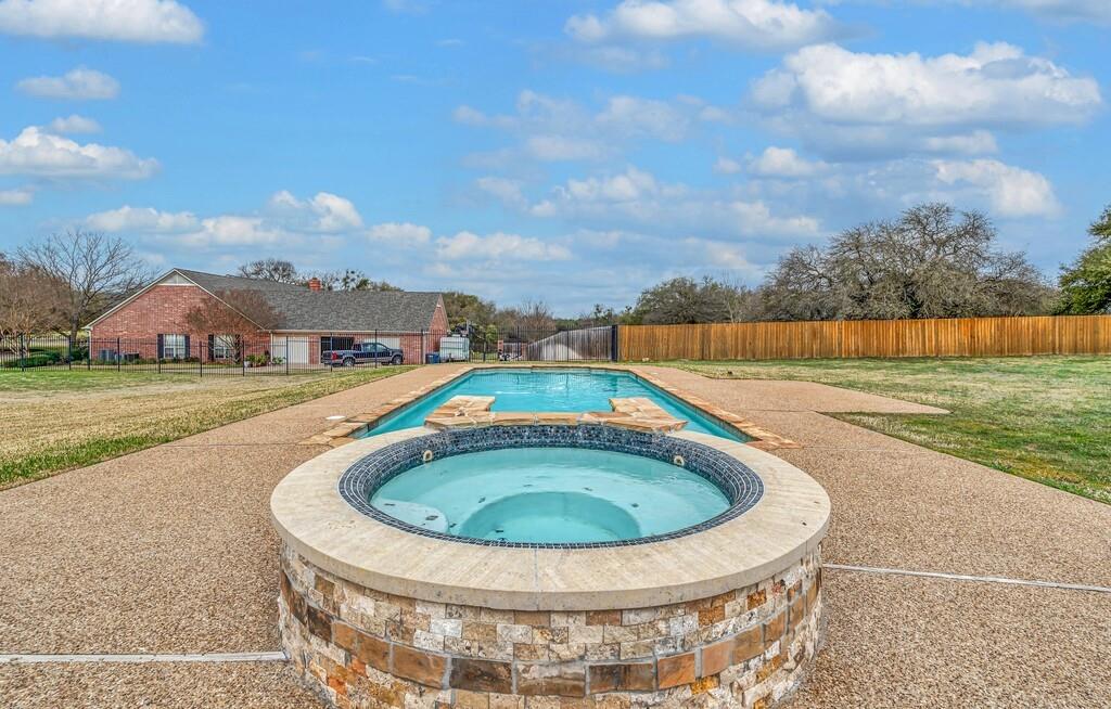 3111 Rockbridge Road Waco, TX 76657 - Photo 36 of 40 a view of swimming pool with a yard