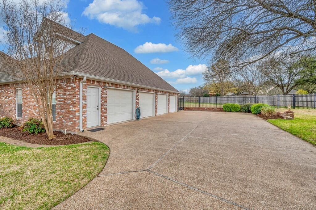 3111 Rockbridge Road Waco, TX 76657 - Photo 37 of 40 a view of a house with a yard