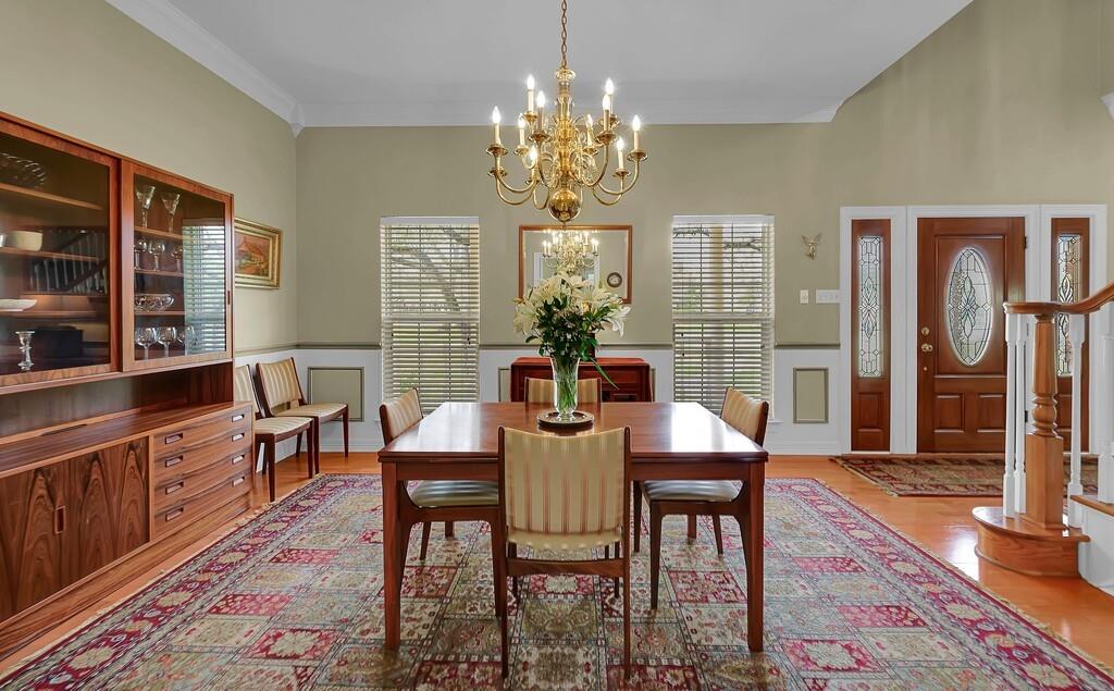 3111 Rockbridge Road Waco, TX 76657 - Photo 9 of 40 a view of a dining room with furniture window and wooden floor