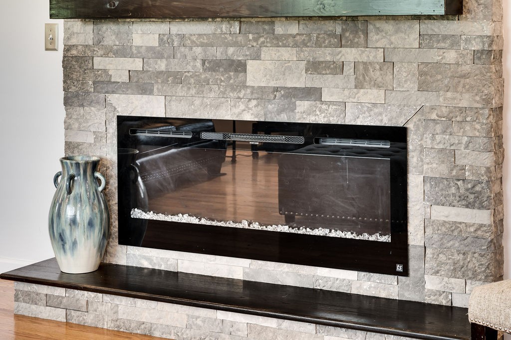 6634 Flewellyn Road Springfield, TN 37172 - Photo 21 of 49 a closeup of a fireplace