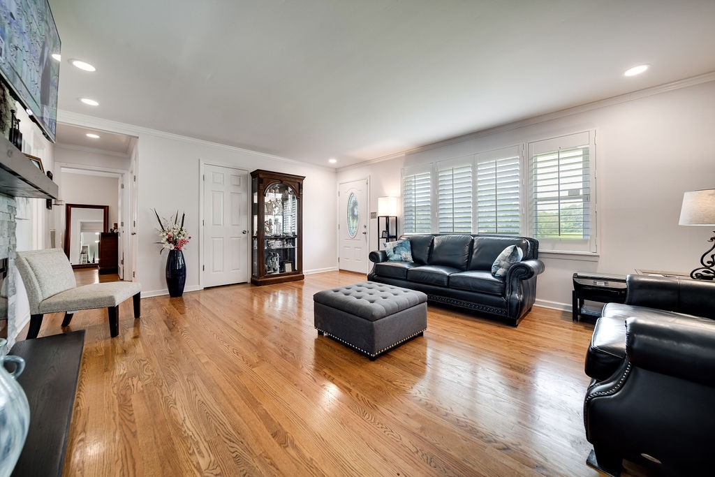 6634 Flewellyn Road Springfield, TN 37172 - Photo 24 of 49 a living room with furniture and wooden floor
