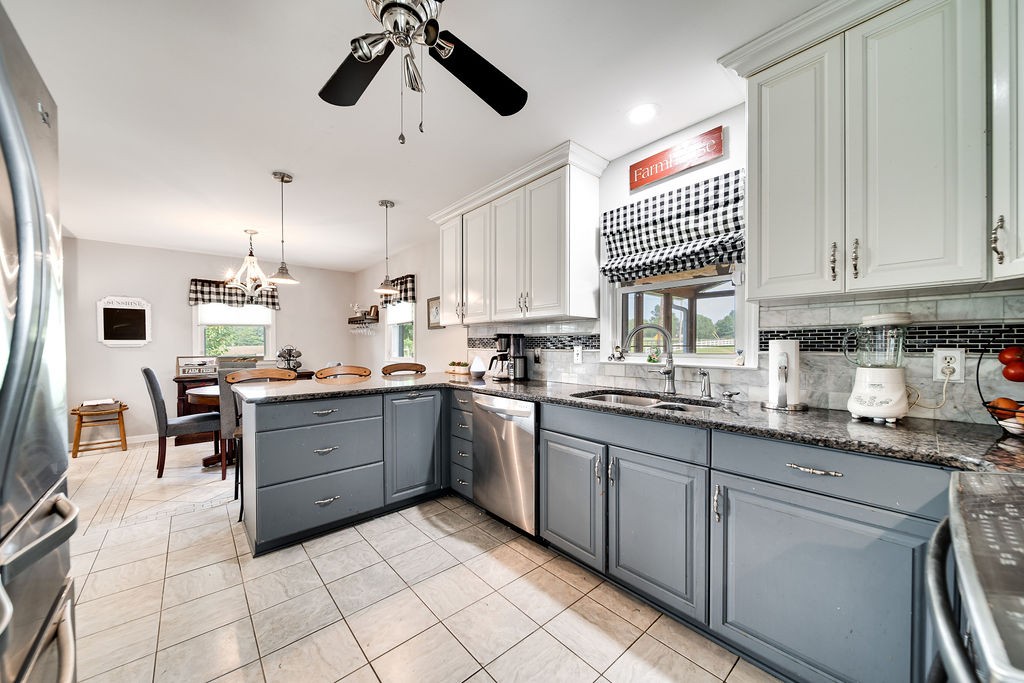 6634 Flewellyn Road Springfield, TN 37172 - Photo 27 of 49 a kitchen with cabinets and window