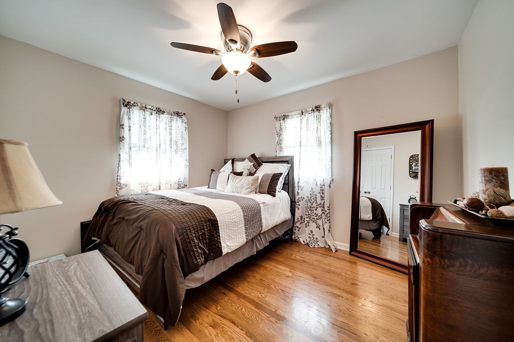 6634 Flewellyn Road Springfield, TN 37172 - Photo 32 of 49 a bed room with a bed and a ceiling fan