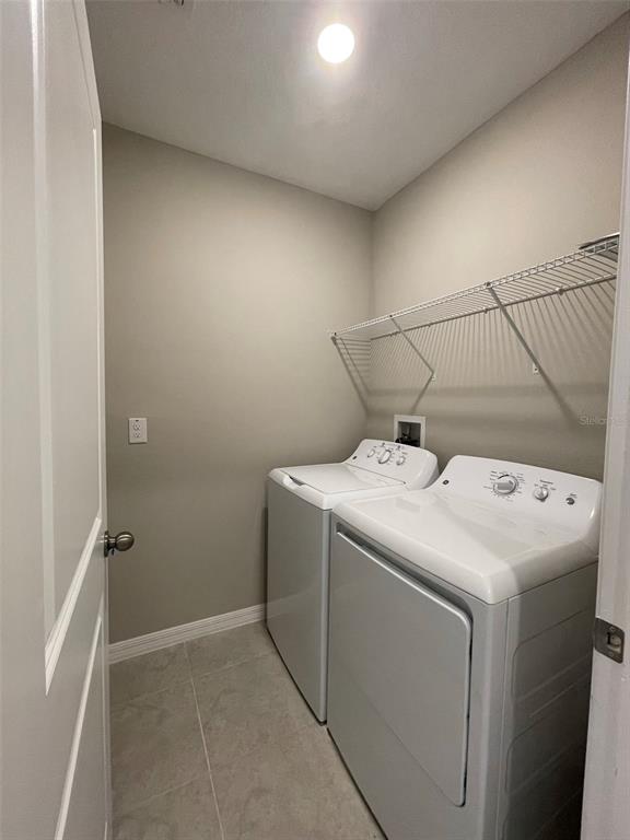 31796 Sun Kettle Loop Wesley Chapel, FL 33545 - Photo 13 of 21 a utility room with dryer and washer