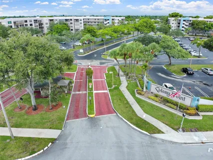 a view of a lake with a yard