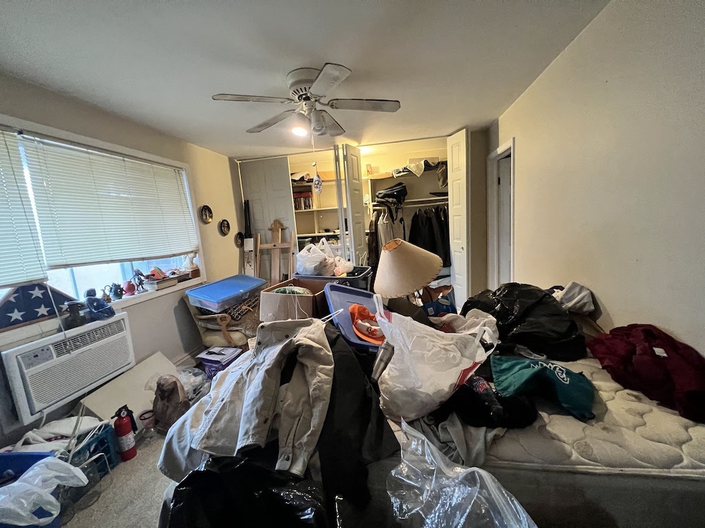 4721 St Joseph Creek Road, Unit 5F Lisle, IL 60532 - Photo 5 of 11 a living room with furniture and a flat screen tv