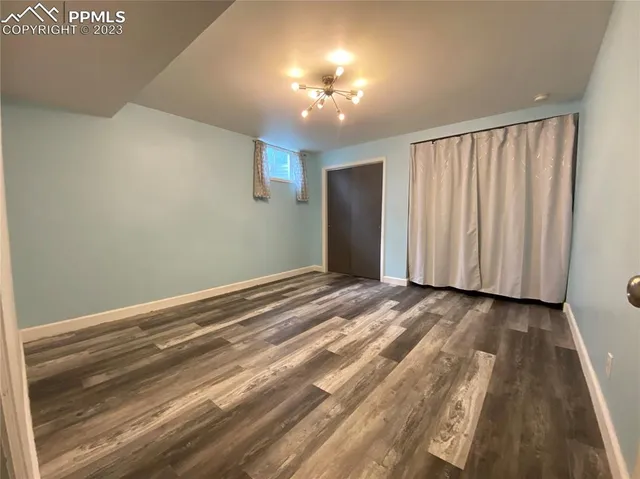 a view of a room with a fireplace