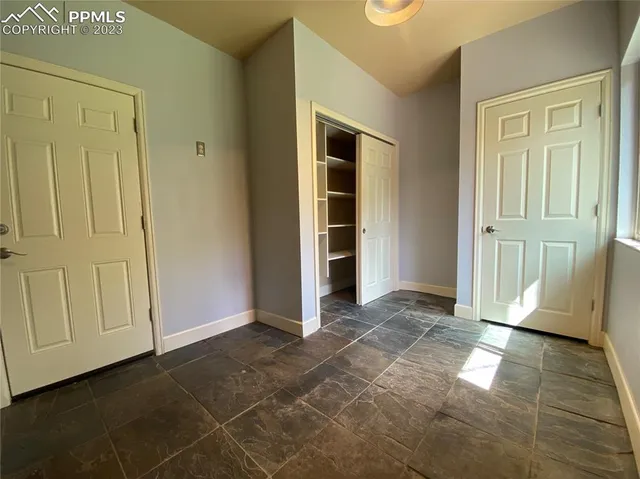 an empty room with windows