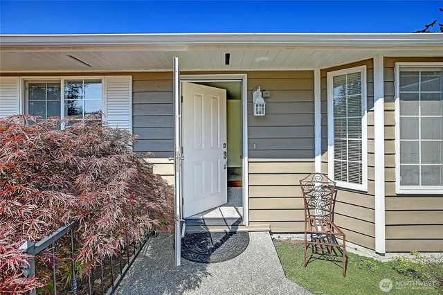 front view of a house with a small yard