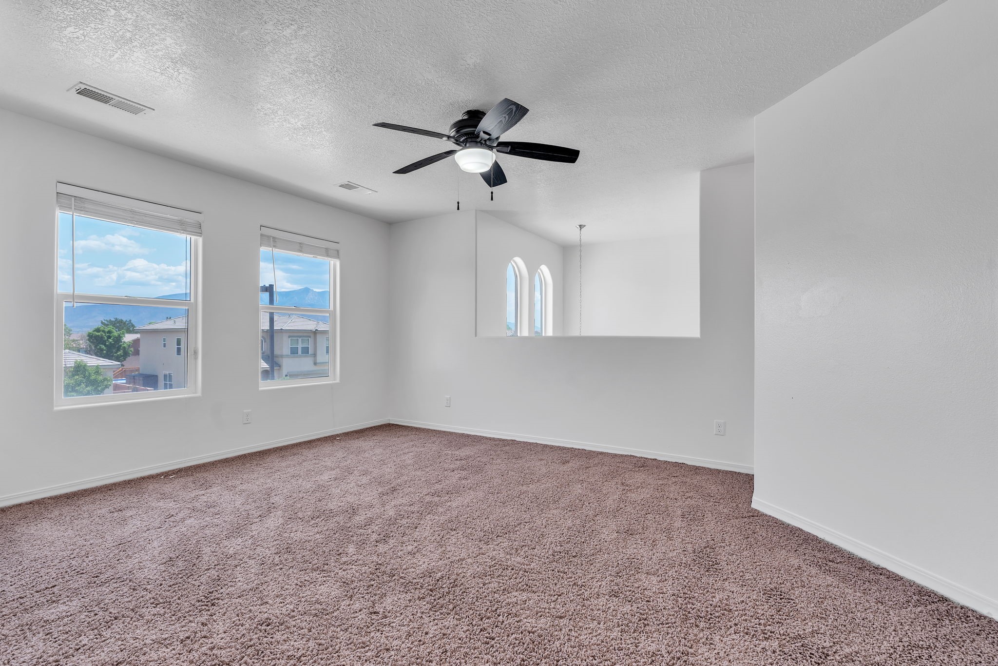 6914 Wrangell Loop Northeast Rio Rancho, NM 87144 - Photo 45 of 61 Second Floor Living Room