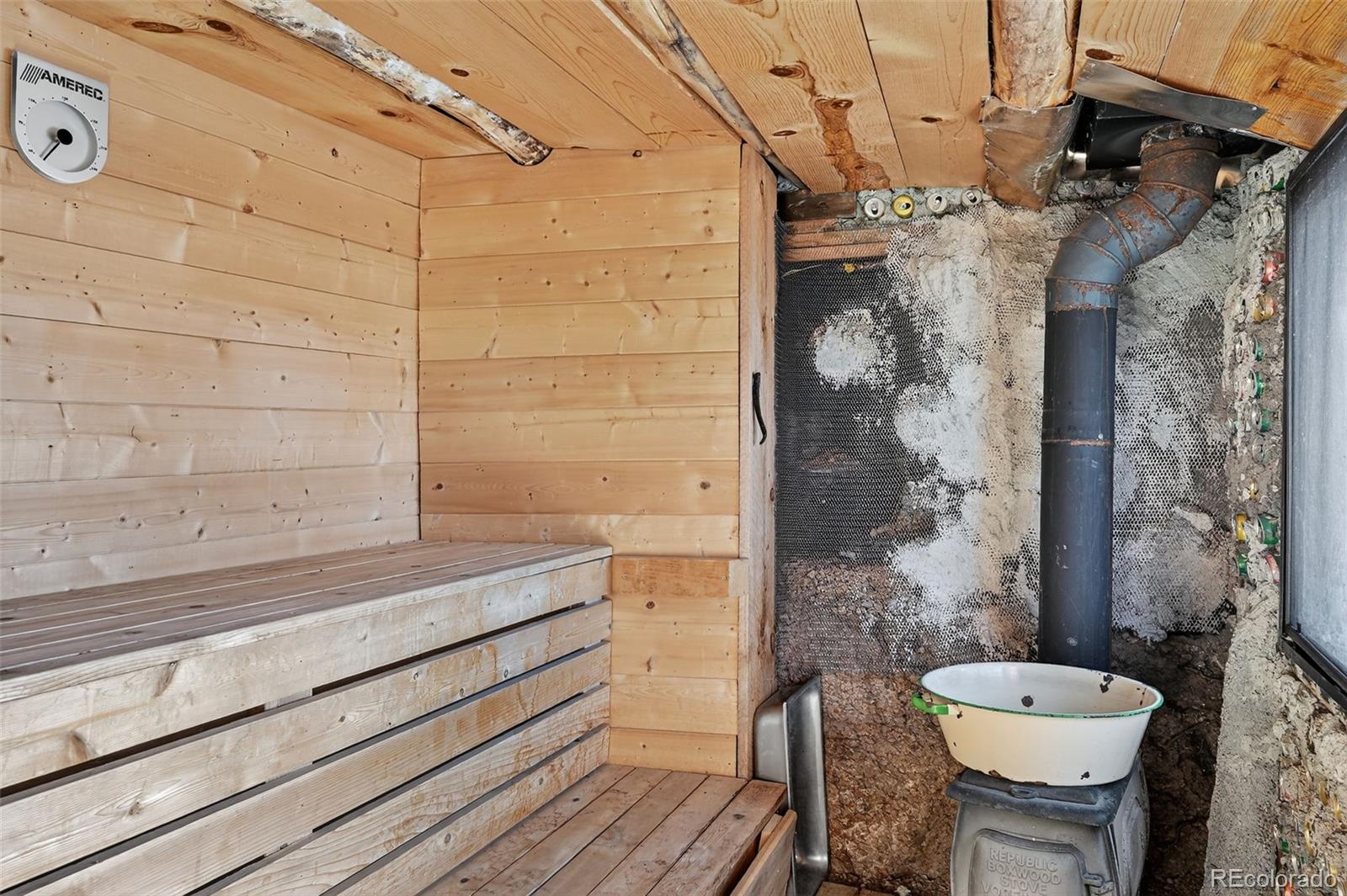 47 Aspen Road Woodland Park, CO 80863 - Photo 24 of 36 a bathroom with a sink and a mirror