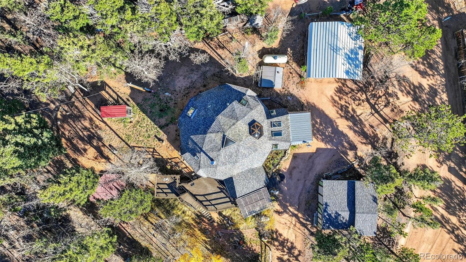 47 Aspen Road Woodland Park, CO 80863 - Photo 25 of 36 an aerial view of house with yard