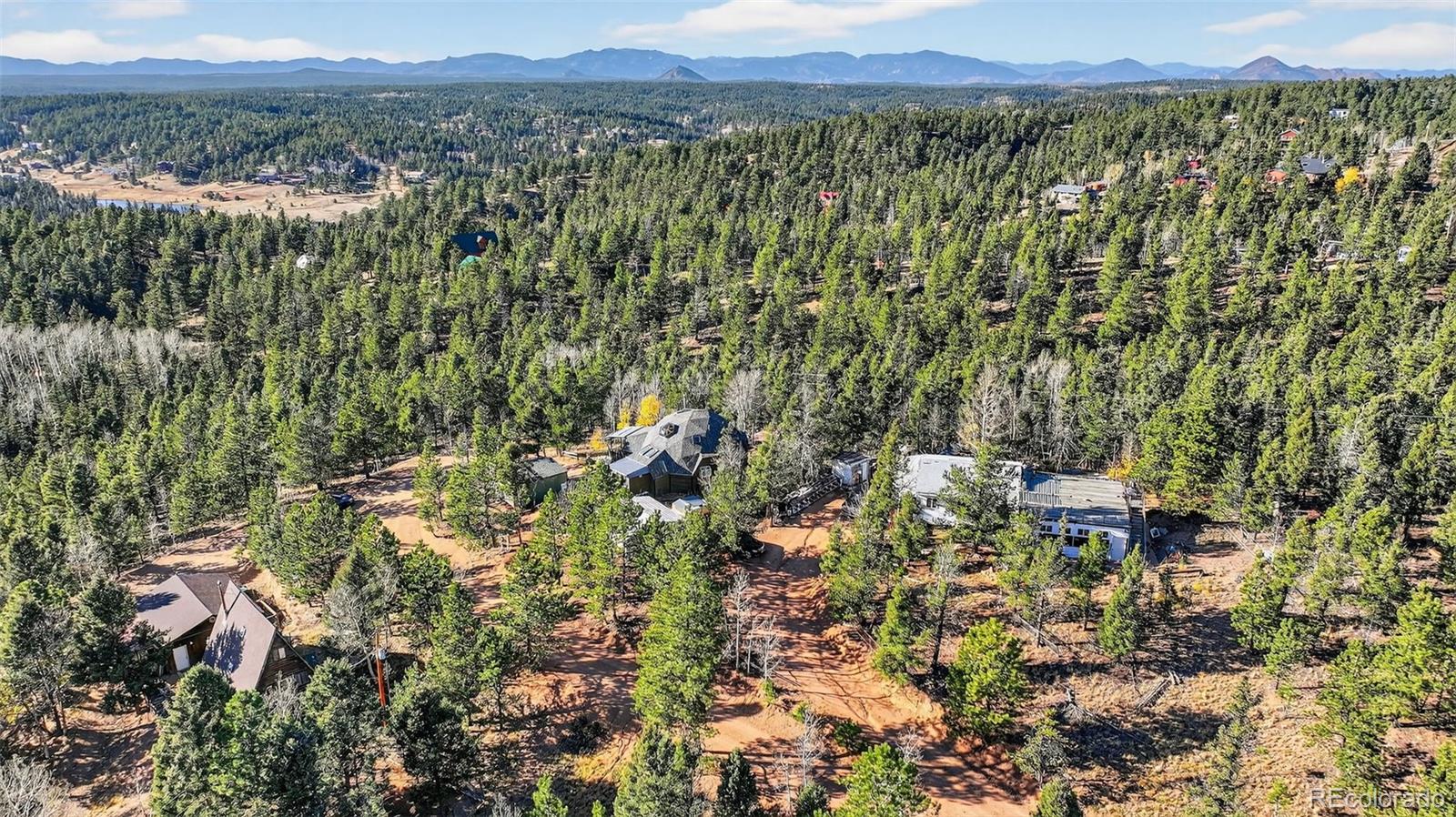 47 Aspen Road Woodland Park, CO 80863 - Photo 29 of 36 a view of a bunch of trees and houses