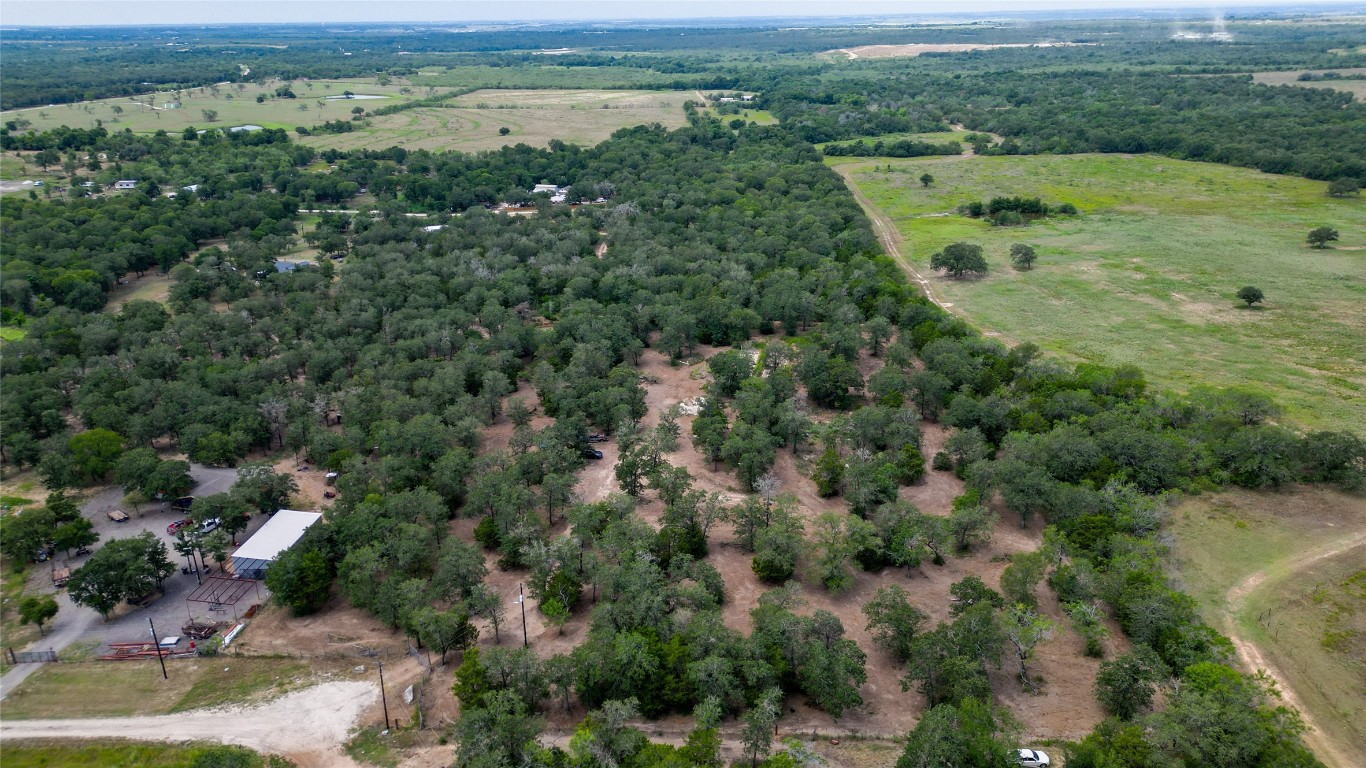 499 Bridgestone Court Lockhart, TX 78644 - Photo 17 of 36 an aerial view of residential houses with outdoor space and trees
