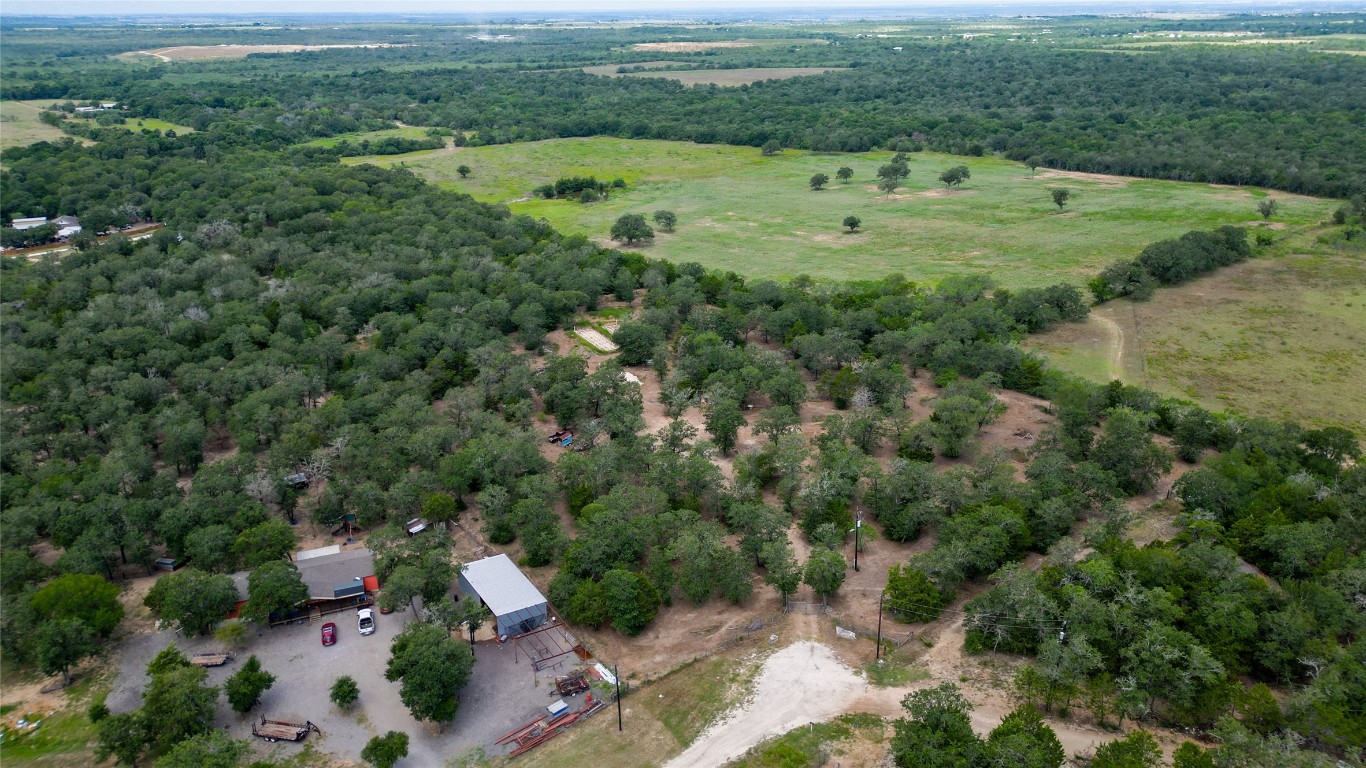 499 Bridgestone Court Lockhart, TX 78644 - Photo 19 of 36 an aerial view of residential houses with outdoor space and trees