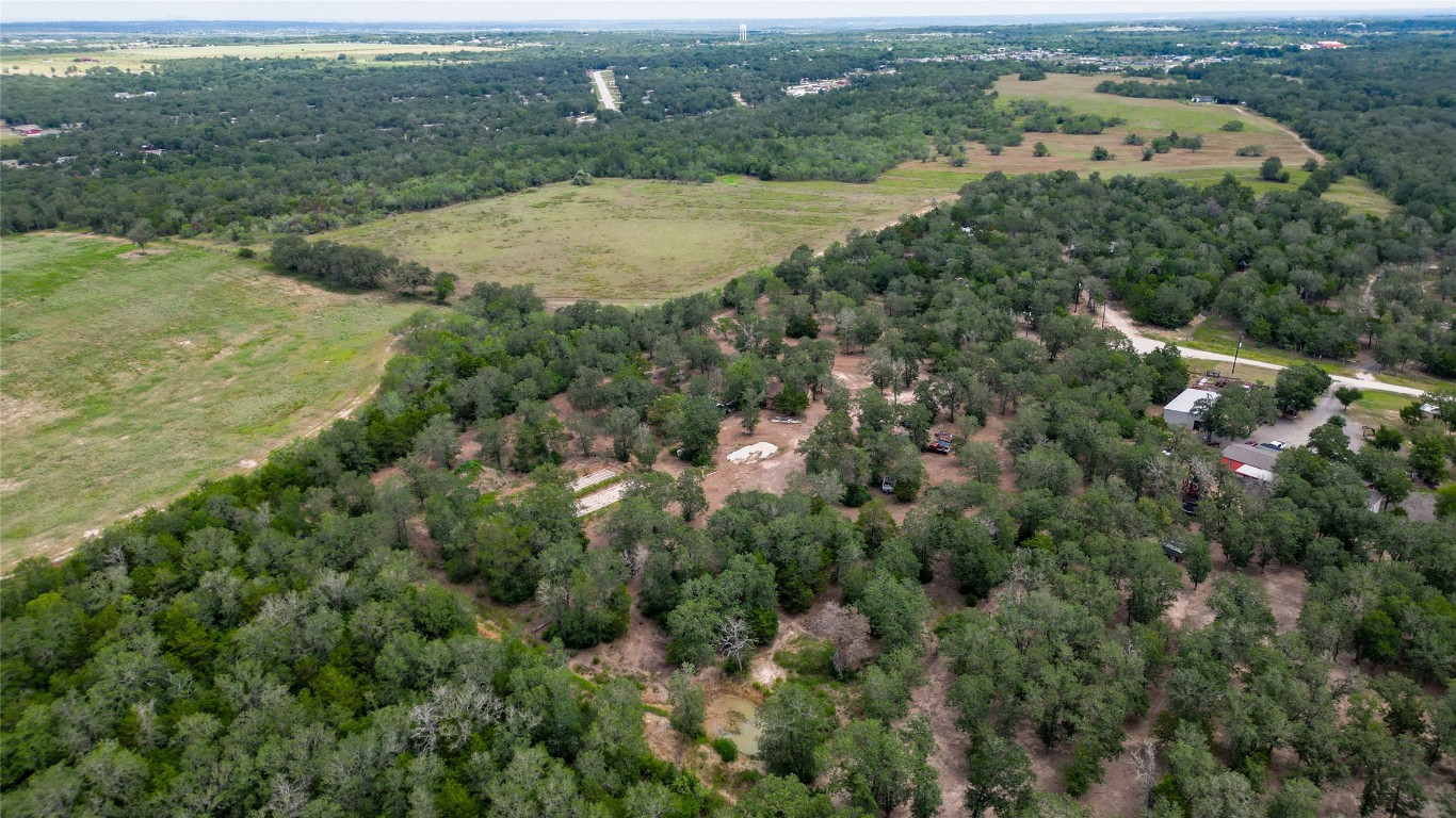 499 Bridgestone Court Lockhart, TX 78644 - Photo 22 of 36 an aerial view of residential houses with outdoor space and trees