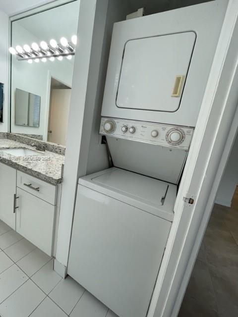 9721 East Bay Harbor Drive, Unit 3C Bay Harbor Islands, FL 33154 - Photo 11 of 17 a utility room with dryer and washer