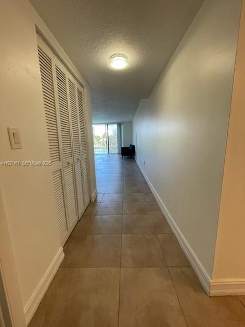 9721 East Bay Harbor Drive, Unit 3C Bay Harbor Islands, FL 33154 - Photo 6 of 17 a view of a hallway