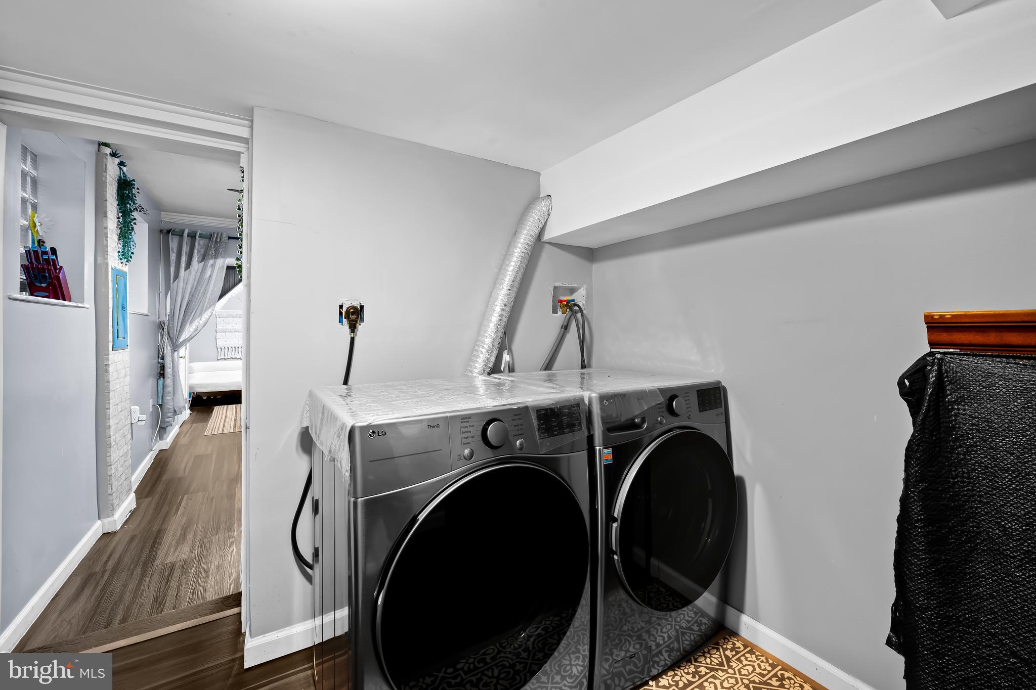 236 South Gilmor Street Baltimore, MD 21223 - Photo 13 of 28 a utility room with dryer and washer