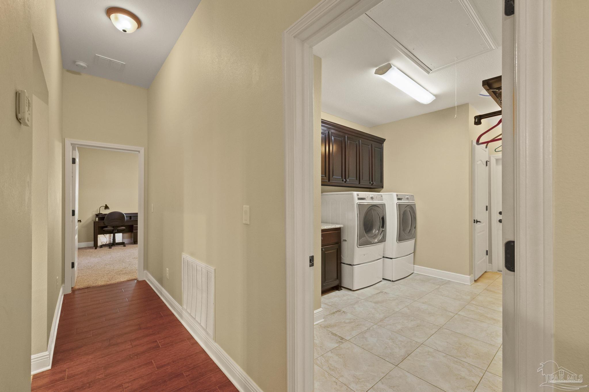 2322 Phylis Rae Drive Pace, FL 32571 - Photo 39 of 72 Hallway to 5th bedroom could be in-law suite