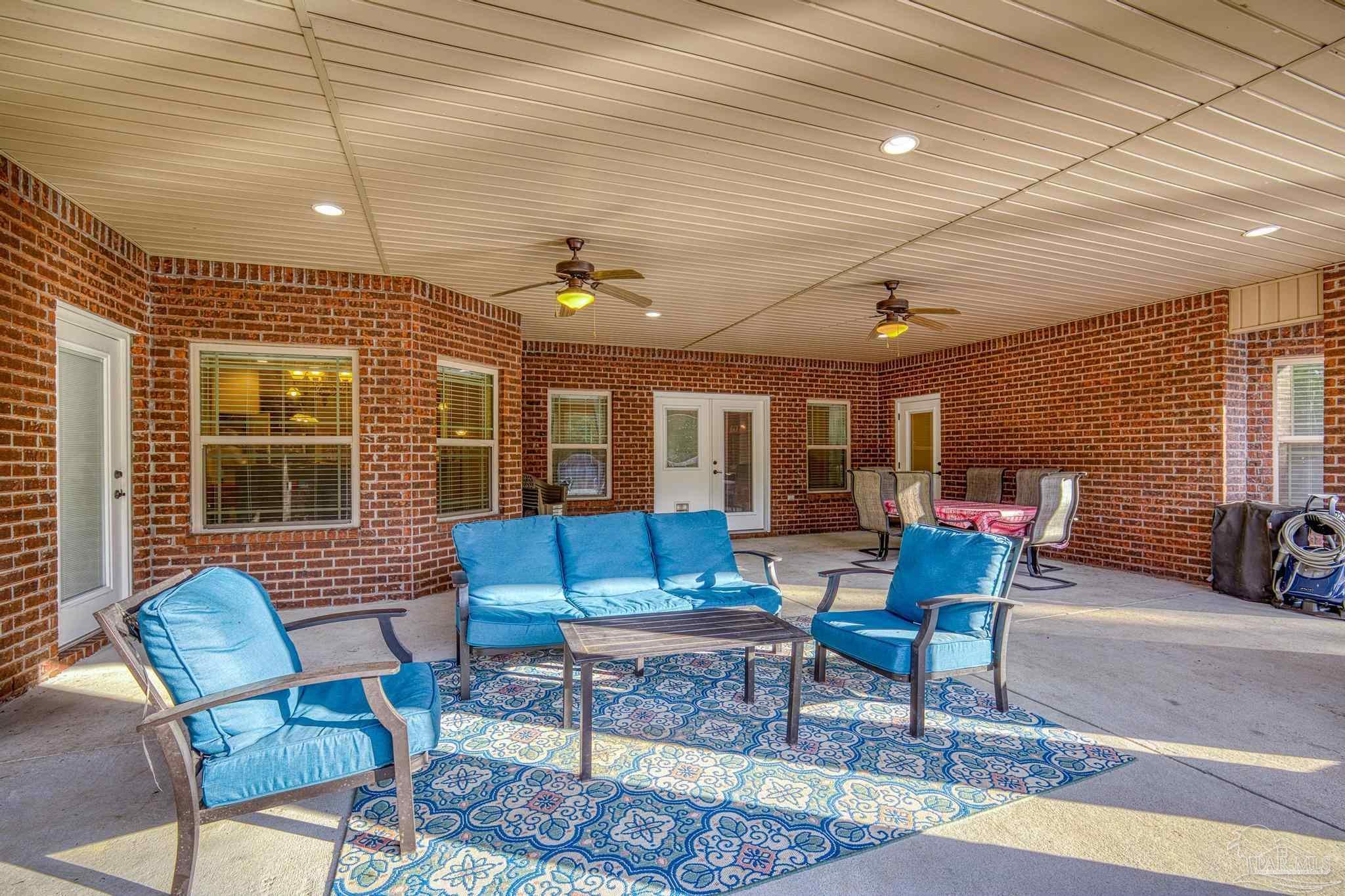 2322 Phylis Rae Drive Pace, FL 32571 - Photo 49 of 72 Left Door is bathroom. Right Door Primary Suite
