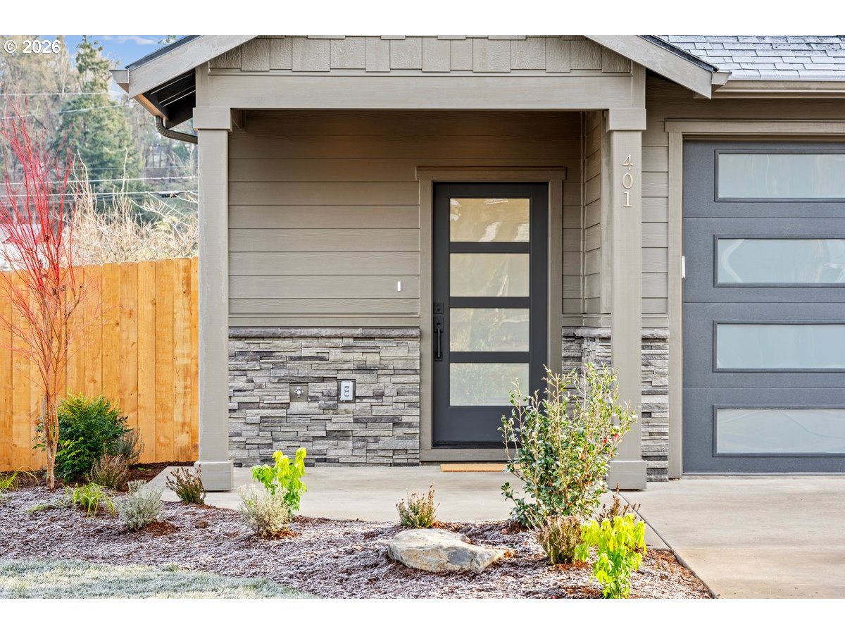 401 South 1st Street Silverton, OR 97381 - Photo 3 of 12 a front view of a house with garden