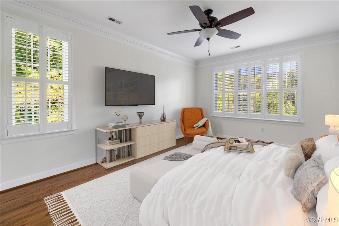 1629 Olmstead Drive Powhatan, VA 23139 - Photo 18 of 50 a bedroom with a bed and a flat screen tv