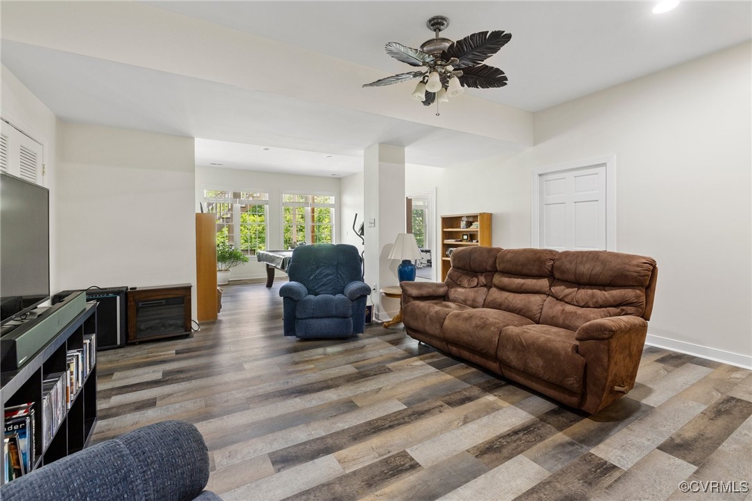 1629 Olmstead Drive Powhatan, VA 23139 - Photo 27 of 50 a living room with furniture and a flat screen tv