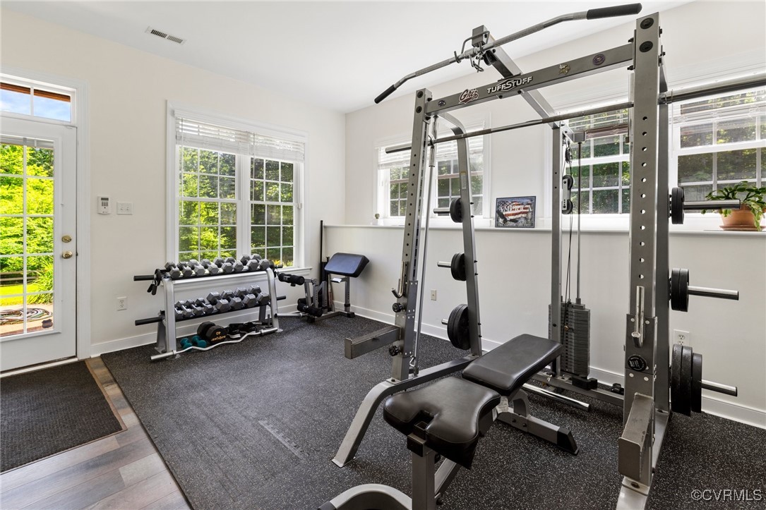 1629 Olmstead Drive Powhatan, VA 23139 - Photo 30 of 50 a room with gym equipment and a window
