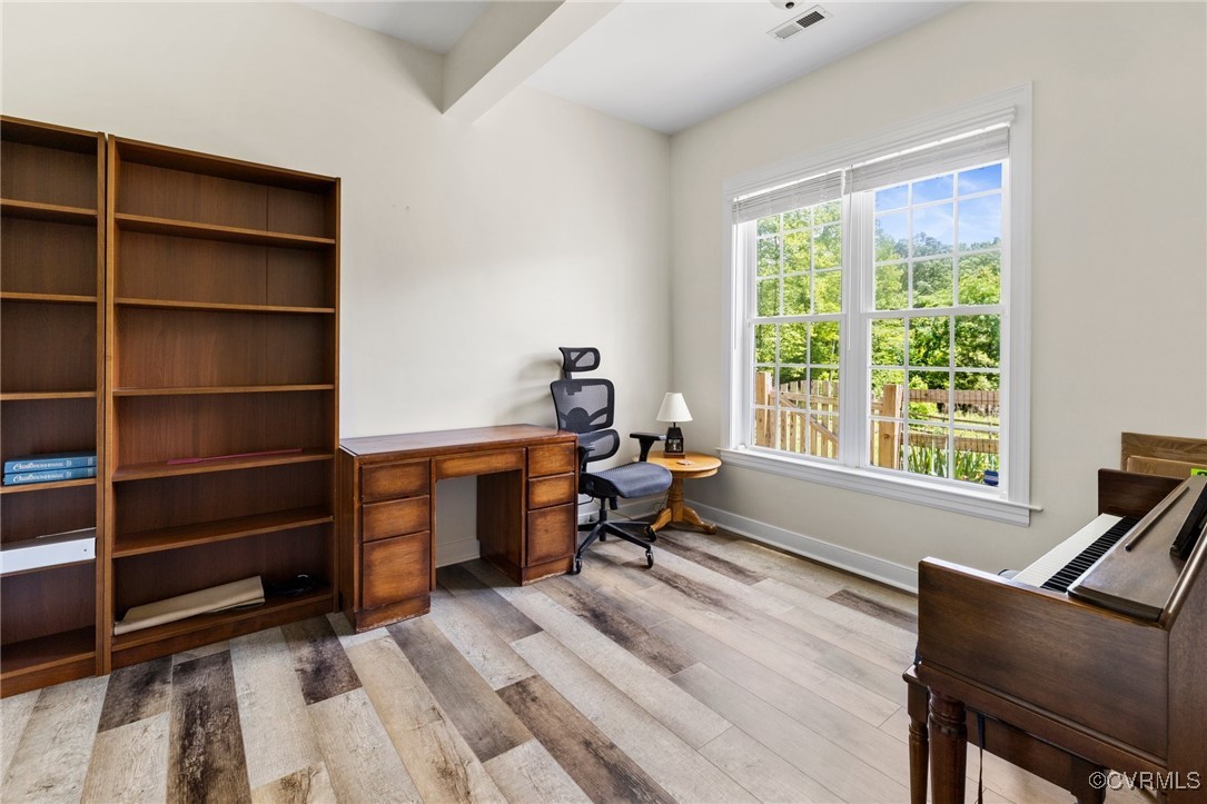 1629 Olmstead Drive Powhatan, VA 23139 - Photo 31 of 50 a living room with furniture hardwood view and a window