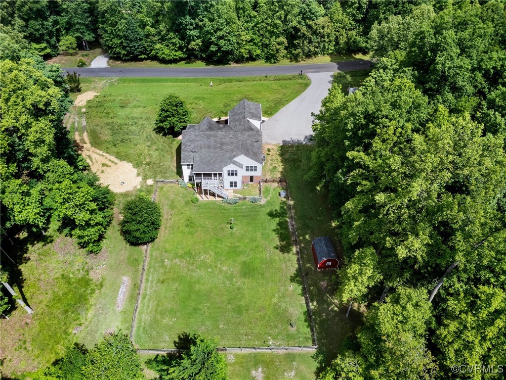 1629 Olmstead Drive Powhatan, VA 23139 - Photo 44 of 50 a view of a garden with a lake