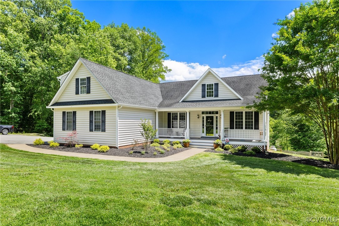 1629 Olmstead Drive Powhatan, VA 23139 - Photo 6 of 50 a front view of house with yard and green space