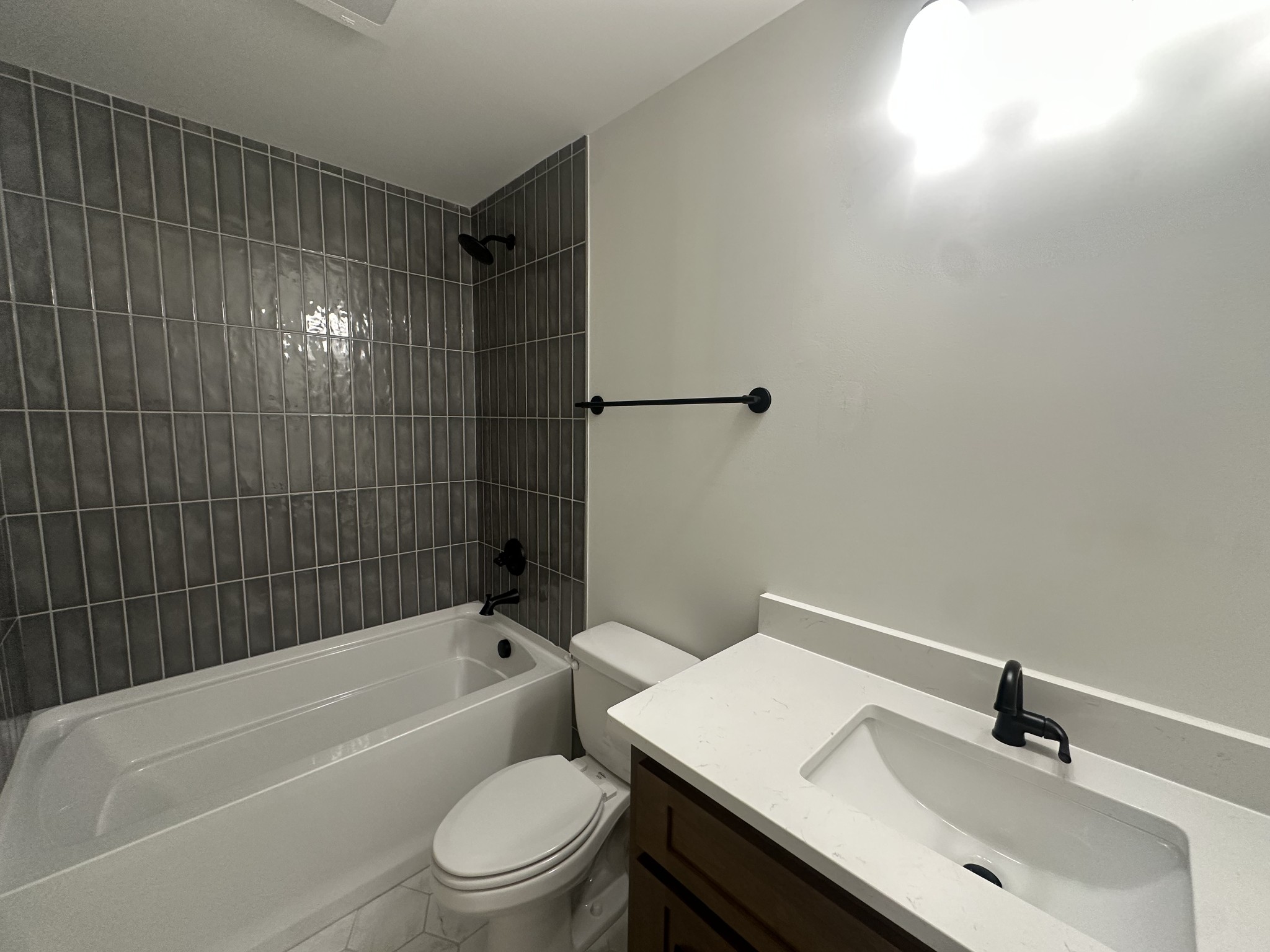 5541 Sinclair Street Murfreesboro, TN 37127 - Photo 13 of 29 a bathroom with a sink a toilet and bathtub
